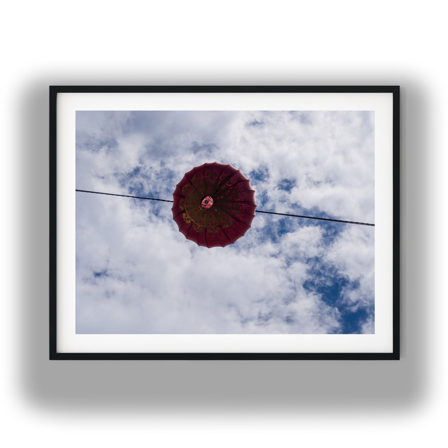 Hanging Lantern Against Cloudy Sky photo print