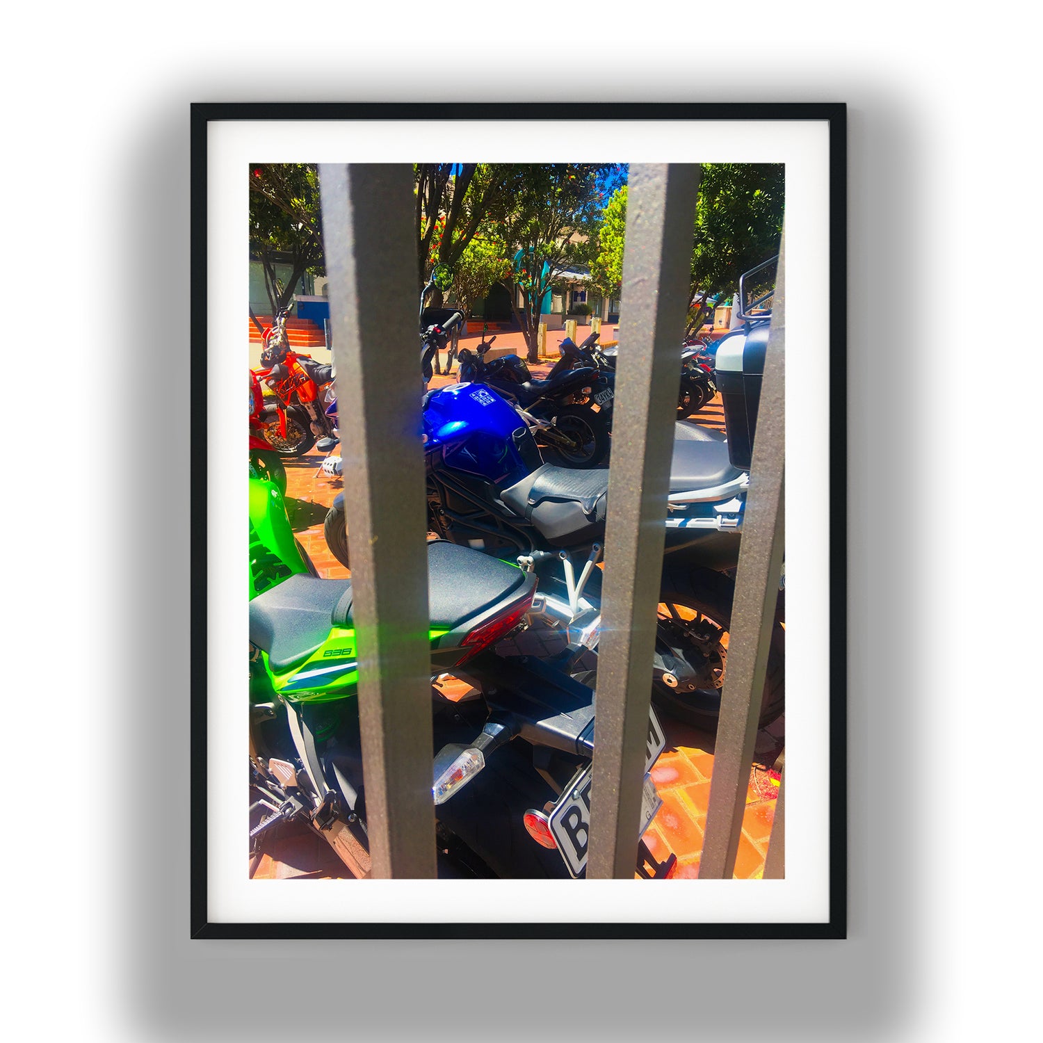 Colorful Motorcycles Behind Railings photo print