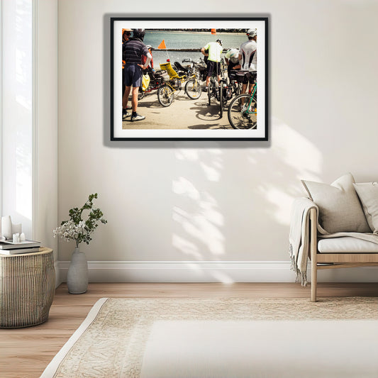 Bicycles and Riders Near Shoreline photo print